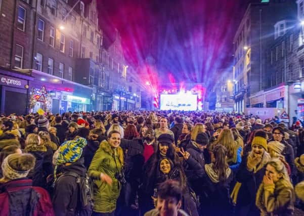 The conduct of revellers at Edinburgh's Hogmanay street party has been praised. Picture: Copyright Chris Watt