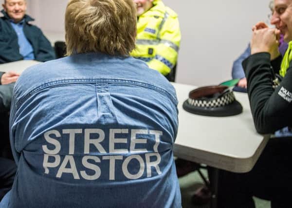 Community officers chatting with the Street Pastors team before they hit the streets

(c) Wullie Marr Photography