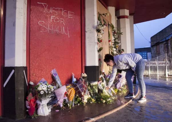 A memorial for Shaun Woodburn outside the old cinema in Great Junction St. Picture: Al Linford.