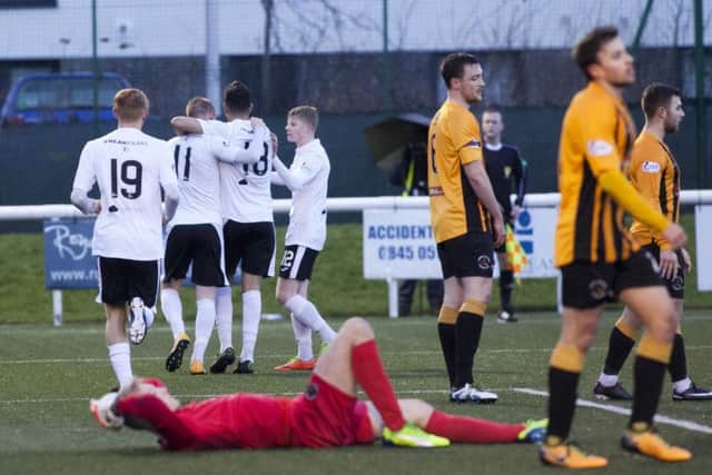 Edinburgh City celebrate Ashley Grimes' opener. Pic: Alastair Linford