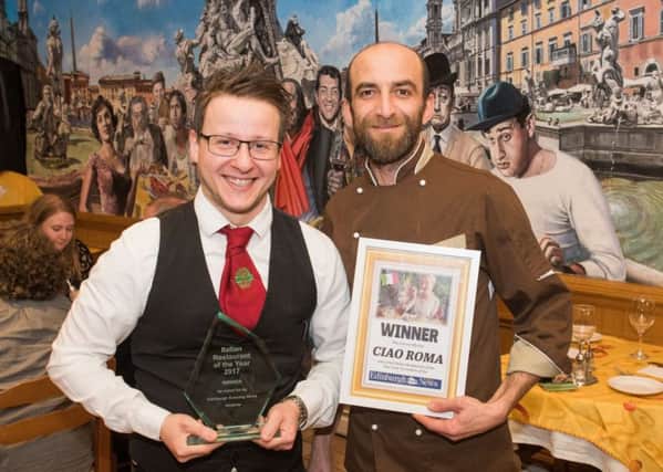 Danilo Argano, supervisor, and Martino Lupoli, head chef,
 with their Italian Restaurant of the year certificate. Picture: Ian Georgeson
