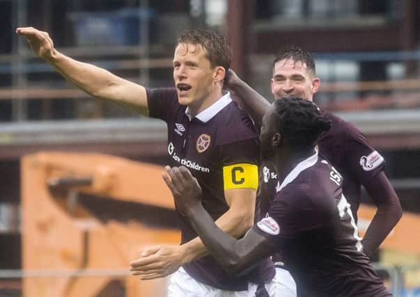 Christophe Berra has played at a high level all season for Hearts. Pic: SNS