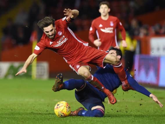 Kyle Lafferty's tackle on Graeme Shinnie earned the Hearts forward a red card but he has lodged an appeal with the SFA, which will be heard on Tuesday