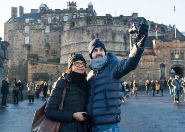 Tourists would not be put off visiting Edinburgh by a modest tax on room rates. Picture: Ian Georgeson