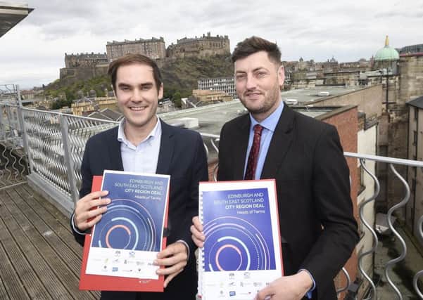 Signing of the heads of terms of the Edinburgh and South East Scotland City Region Deal. Council Leader Adam McVey and Councillor Cammy Day. Picture; Greg Macvean