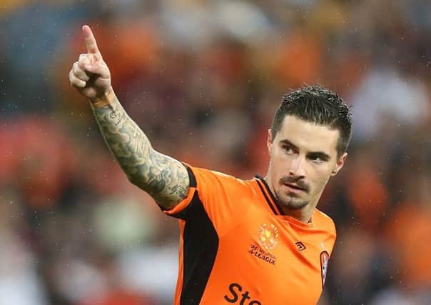 Darmstadt 98 striker Jamie Maclaren, pictured playing for Brisbane Roar, was in talks with Hearts, but it now appears his destination is Hibs. Pic: Getty