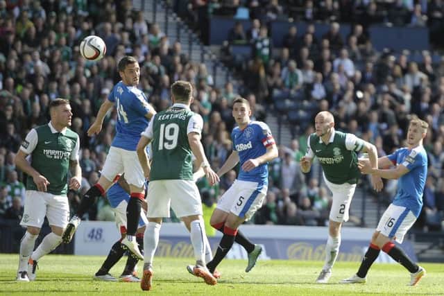 Gray heads home the winning goal in the 2016 Scottish Cup final. Pic: SNS
