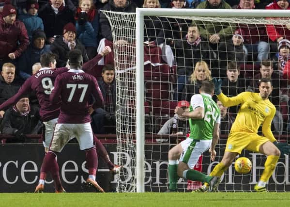 Kyle Lafferty shoots just wide during the last meeting between Hearts and Hibs. Picture: SNS Group