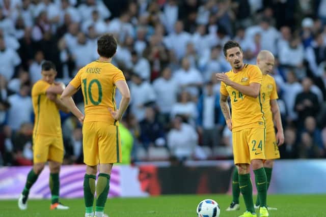 Jamie Maclaren, pictured right, is desperate to force his way back into the Australia reckoning. Pic: Getty
