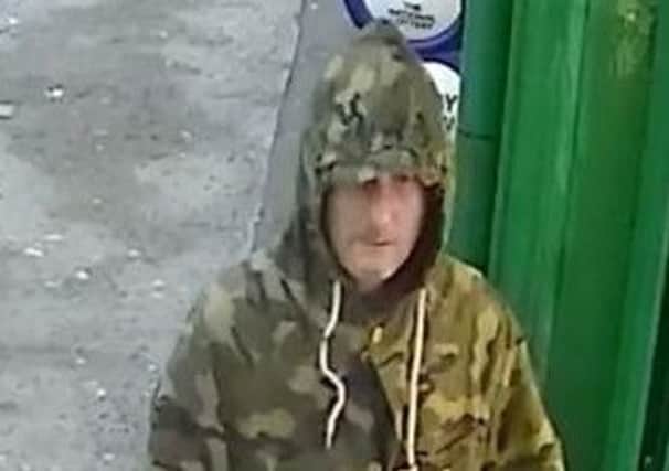 Police are looking for this man in connection with an armed robbery in Leith