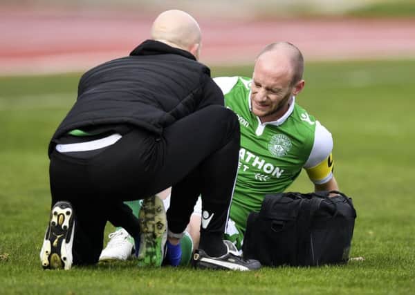David Gray suffered an ankle injury early in the match