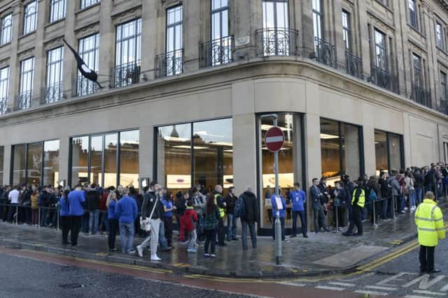 Apple fans queue outside the Edinburgh store prior to its opening in 2014. Picture: Andrew O'Brien/JP Licence