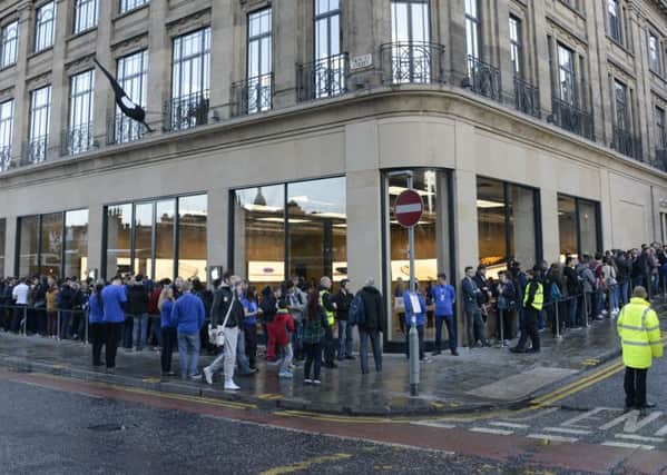 Apple fans queue outside the Edinburgh store prior to its opening in 2014. Picture: Andrew O'Brien/JP Licence