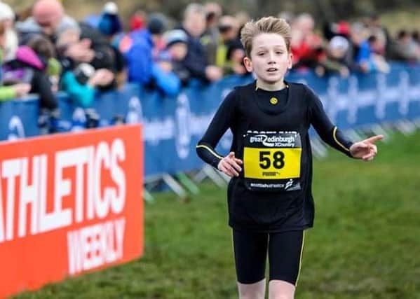 Harry Henriksen en route to victory in the under 13 boys race at the Great Edinburgh International Cross Country, Saturday 7 January 2017.