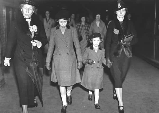 Princess Elizabeth and Princess Margaret with Lady Helen Graham and Miss Marion Crawford (right) ) after their first ride on the Underground in 1939.  (PIC: Getty Images).