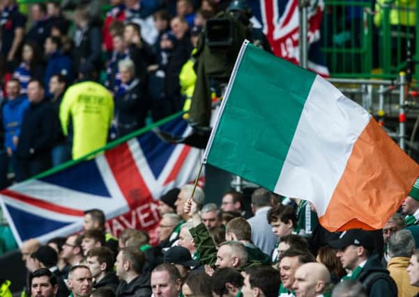 Union flags and Irish tricolours at an Old Firm match. Picture: John Devlin