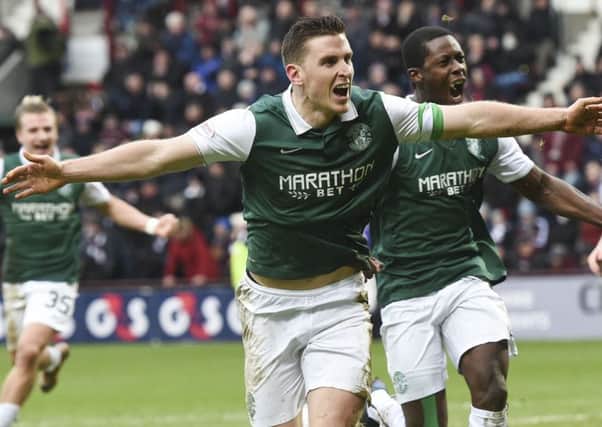 Paul Hanlon celebrates after scoring his late equaliser in the 2-2 draw at Tynecastle in the Scottish Cup in 2016