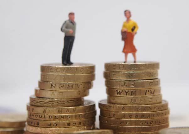 Some 100,000 more women are paid less than the living wage than men. Picture: PA