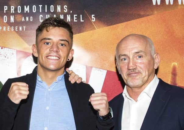 Capital boxer Lee McGregor pictured with his manager Barry McGuigan. Pic: SNS