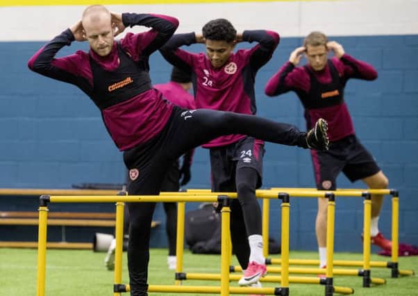 Steven Naismith, Demetri Mitchell and Christophe Berra are put through their paces at the Oriam. Picture: SNS Group