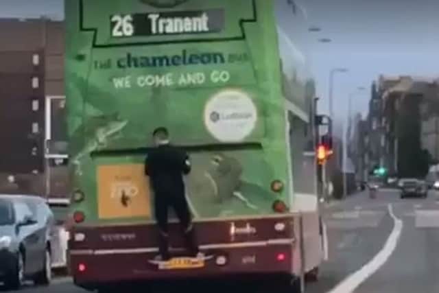 A boy was filmed 'bus surfing' a Lothian Bus to Tranent. Picture: Unknown/Screen grab