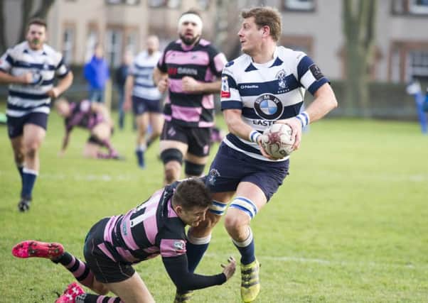 Iain Wilson prepares to pass the ball for Heriot's against Ayr. Pic: Ian Rutherford