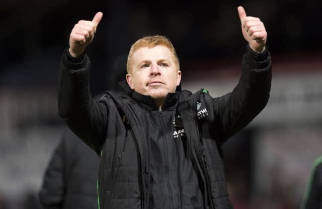 Hibernian manager Neil Lennon celebrates at full-time after his side defeated Dundee. Picture: SNS