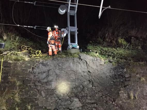Network Rail engineers working overnight on the Winchburgh landslip. Picture: Network Rail