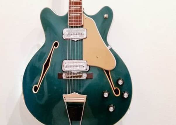 Paul Haig's guitar - and it's definitely Lake Placid Blue