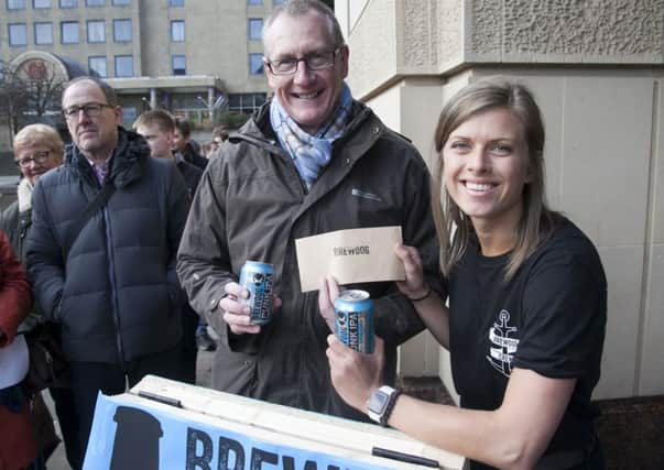 Opening of Brewdog pub in Lothian Road where customers were given a raffle ticket to win various prizes. Marketing manager Sydney Paulsen with a raffle ticket for the first in line Gary Holcroft