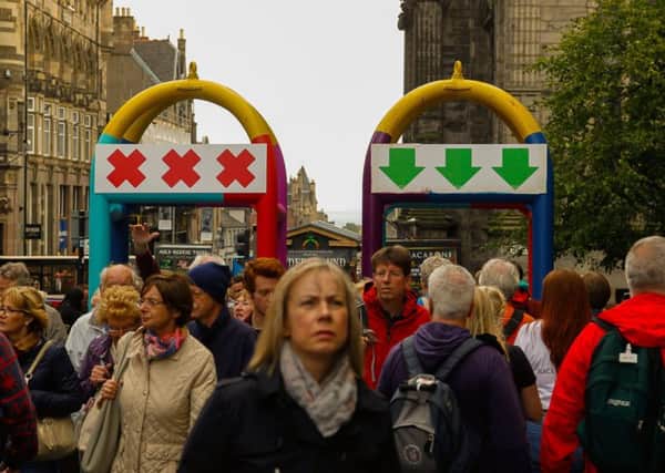 Crowd barriers installed in the High Street for the duration of the Edinburgh Festival