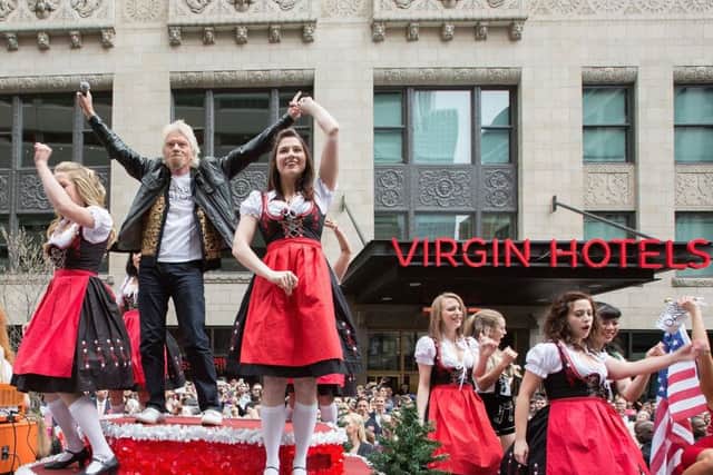 Richard Branson celebrates the grand opening of Virgin Hotels Chicago by recreating the iconic parade scene from Ferris Bueller's Day Off. Picture: GETTY