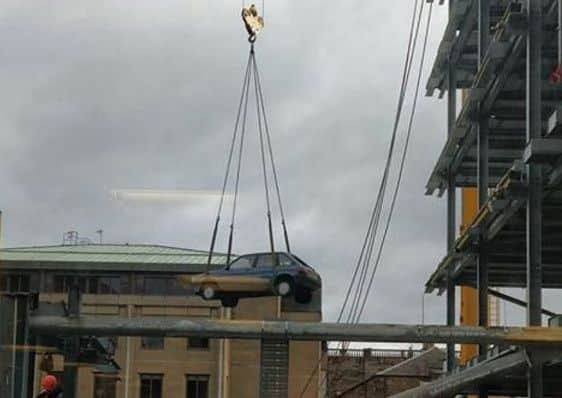 The cars have been lifted out of the 'robot' car park, Picture: David Hickey