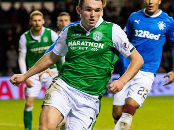John McGinn, the scorer of Hibs first goal, in action at Ibrox this afternoon
