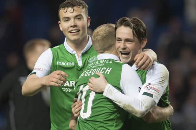 Ryan Porteous, left, with Dylan McGeouch and Scott Allan