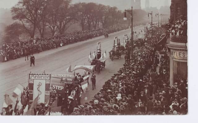 A suffragette march on Princes Street.