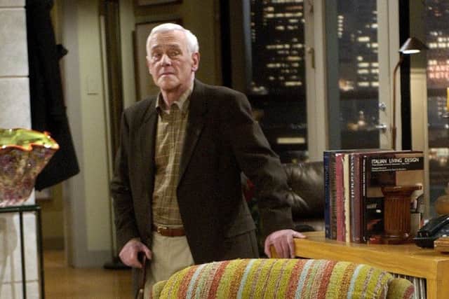 John Mahoney, famously known as Martin Crane, appears on the set during the filming of the final episode of "Frasier" in Los Angeles.
