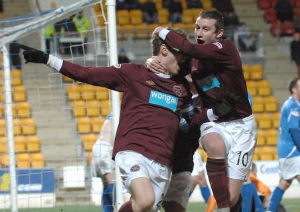 Stephen Elliott celebrates with goalscorer Marius Zaliukas back in 2012