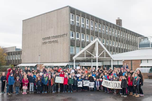 Parents and pupils protest outside Currie High School. Picture: Ian Georgeson