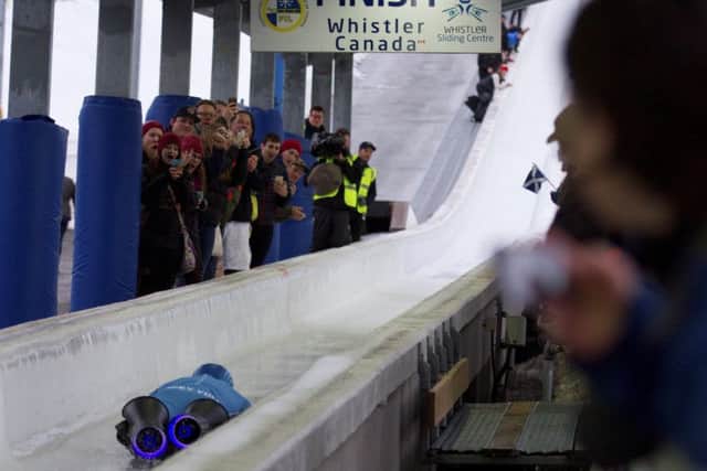 Royal Engineer and double amputee Micky Yule opn his winning skeleton run, Picture: SWNS