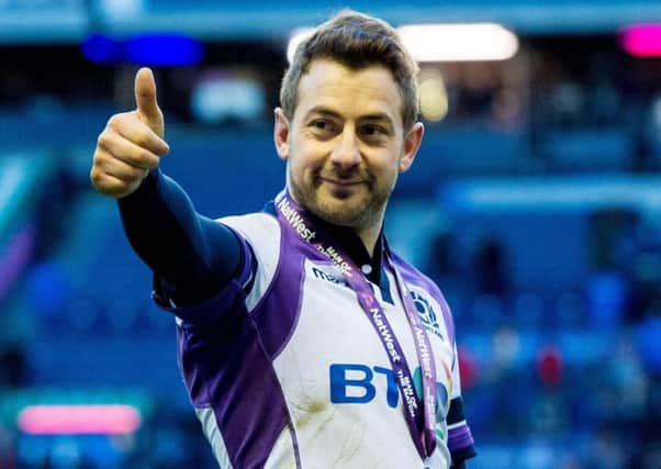 Greig Laidlaw salutes the Scotland fans at full time