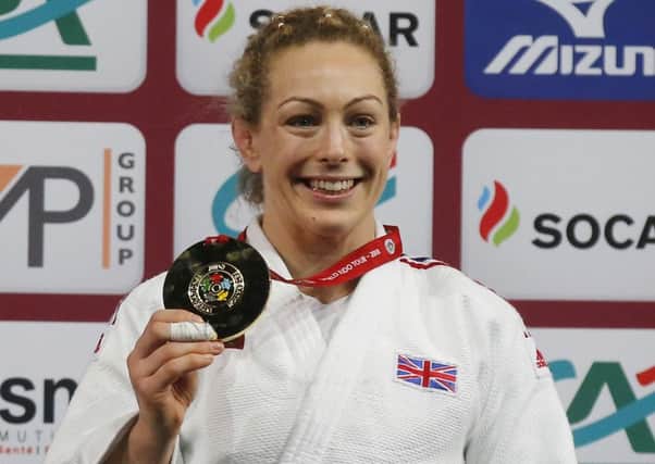 Sally Conway shows off her gold medal