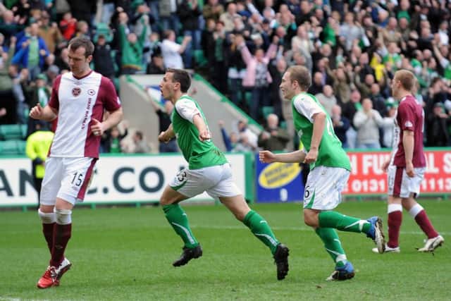Liam Miller, who played for Hibs between 2009 and 2011, celebrates scoring against Hearts. Pic: TSPL