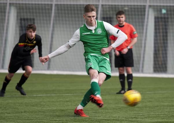 Hibs' Oli Shaw completes his hat-trick against Partick from the penalty spot. Pic: TSPL