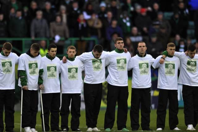 Hibs players held a tribute to David Paul before their match against Kilmarnock at Easter Road