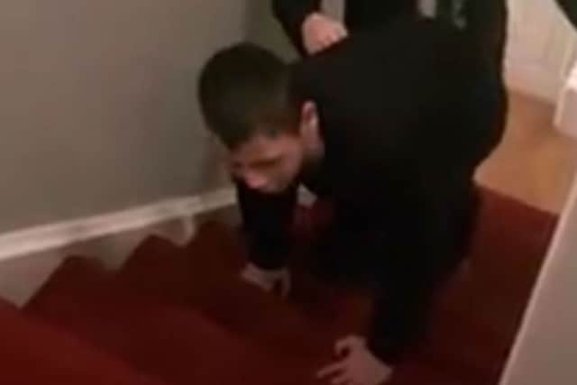 The video shows Steven having to crawl up the stairs on his hands and knees and shuffle back down on his bottom, Picture: Rachael Barrett / Deadline News