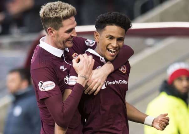 Hearts sealed their place in the last eight by beating St Johnstone