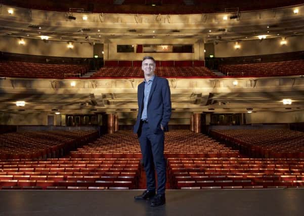 Theatre Director Colin Marr on the stage of the Edinburgh Playhouse