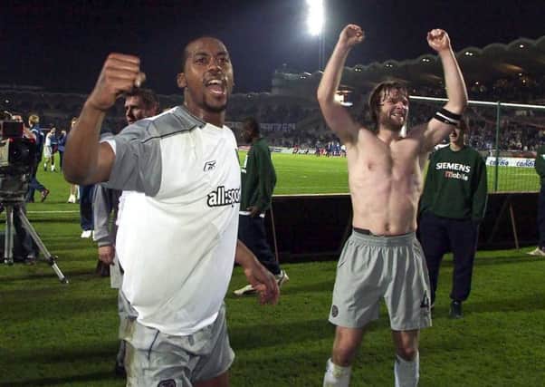 Mark De Vries (left) and Steven Pressley celebrate after Hearts' victory over Bordeaux. Picture: SNS