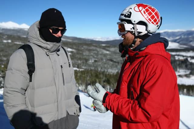 (L-R) Coach Hamish McKnight talks with snowboarder Dom Harington of Team GB. Picture; Getty